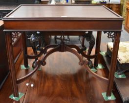 A Reproduction Mahogany Silver Table, with pierced spandrals and shaped stretchers, 81cm by 53cm