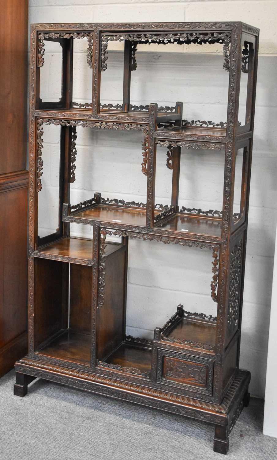 A Chinese Export Carved Hardwood Display Cabinet, early 20th century, the framework carved as a - Image 14 of 14