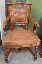 A Late Victorian Walnut Leather Upholstered Library Chair