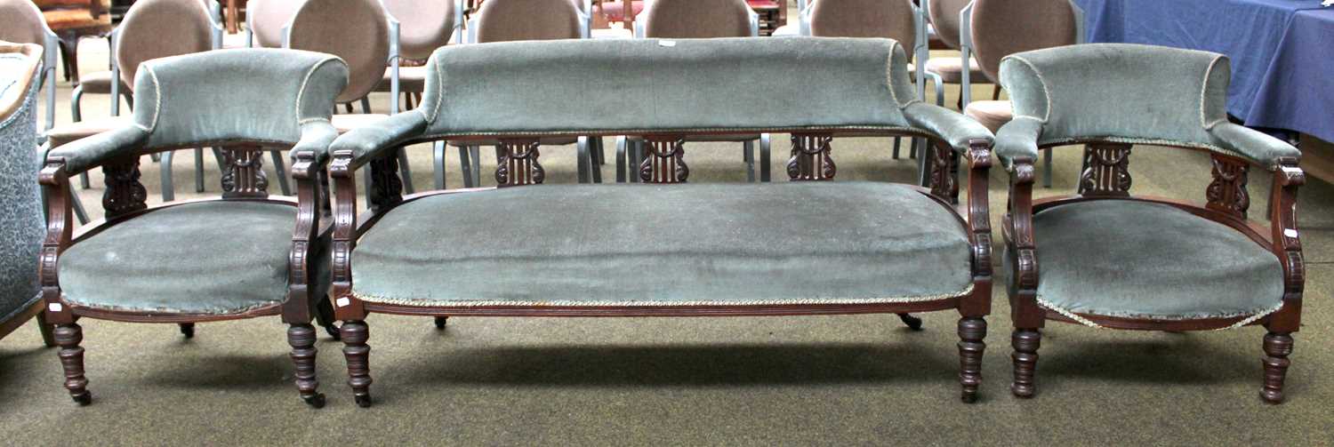 An Early 20th Century Three Piece Mahogany Salon Suite, comprising settee with two chairs, padded