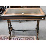 A 19th century Ebony and Amboyna Fold Over Card Table, with gilt metal mounts, 92cm by 46cm by 74cm