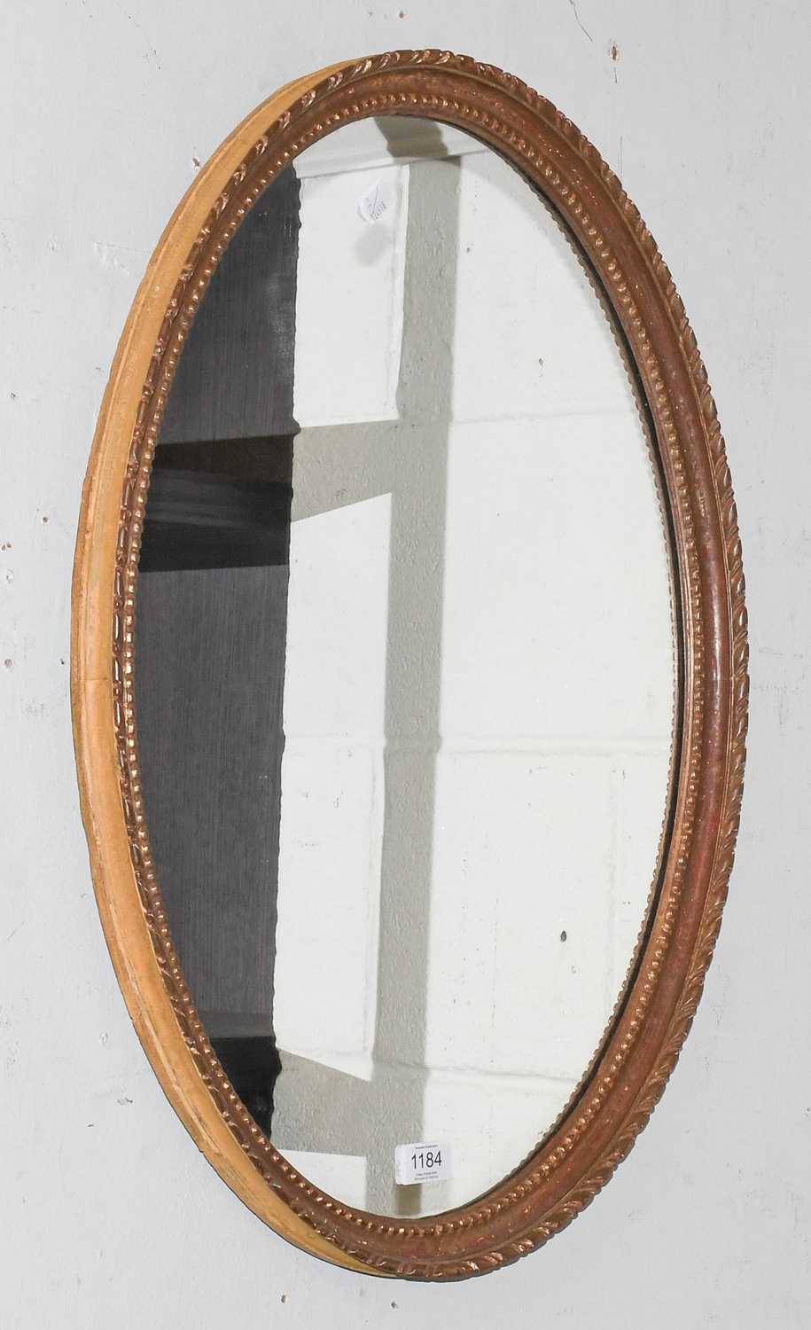 A 19th Century Gilt Framed Oval Mirror, 66.5cm by 48.5cm