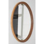 A 19th Century Gilt Framed Oval Mirror, 66.5cm by 48.5cm