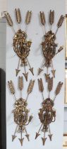 A Set of Four Gilt Arrow Motif Twin Light Wall Sconces, 90cm