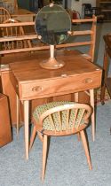 A Ercol Light Elm Dressing table, with single drawer, on splay supports with turned stretchers. 69cm