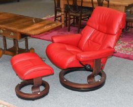 A Stressless Red Leather Reclining Armchair, and stool Armchair - End strip of zip visible,