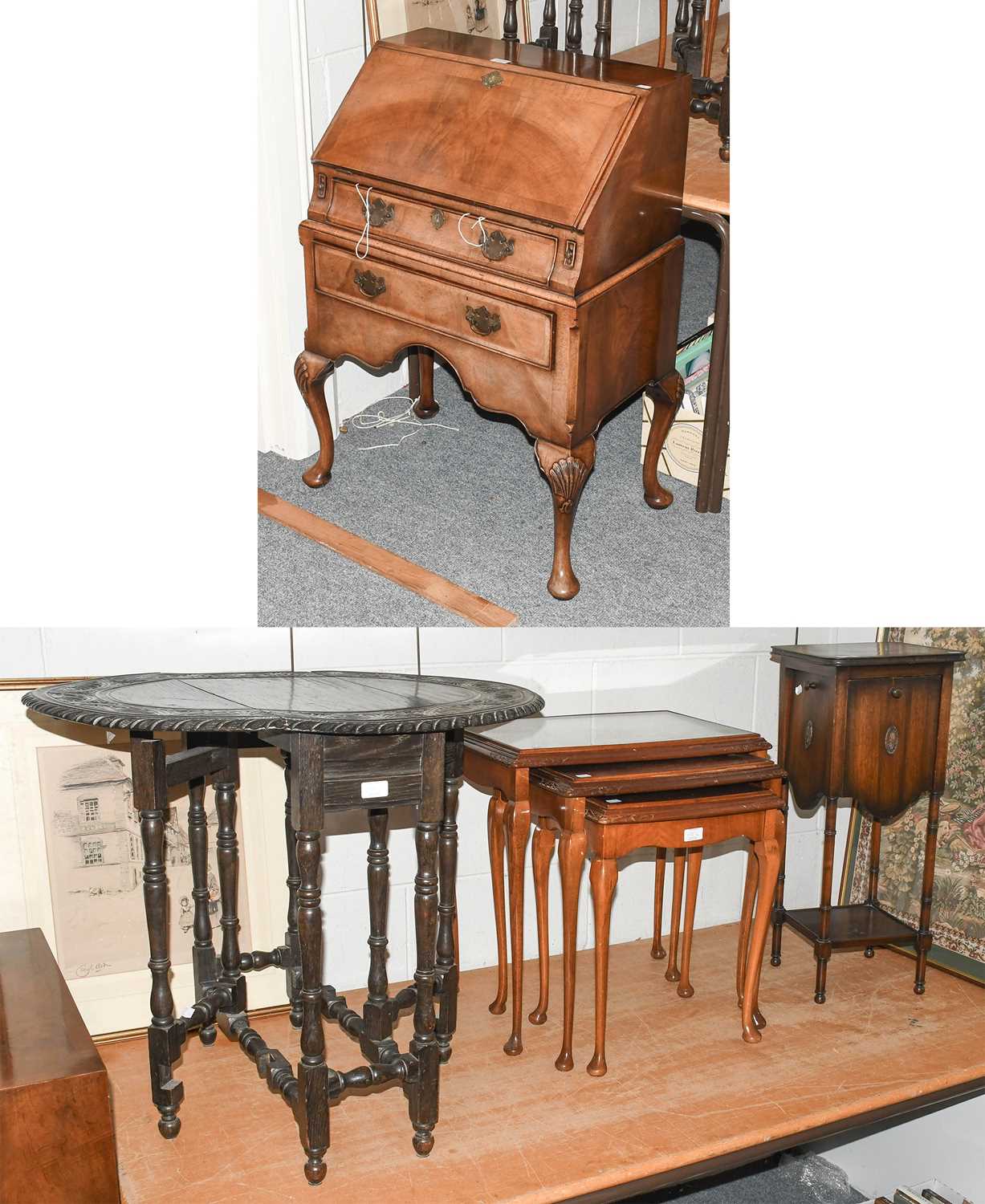 A 20th Century Walnut Bureau, an oak drop leaf table, a nest of reproduction burr walnut tables