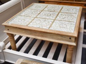 A Pair of Oka Mango Wood Coffee Table of square form, glazed carved floral top, turned legs, 46cm by