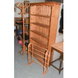 A Pine Open Bookcase, 106cm by 26cm by 180cm; together with a coat stand and a towel rail (3)