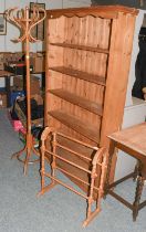 A Pine Open Bookcase, 106cm by 26cm by 180cm; together with a coat stand and a towel rail (3)