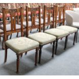 A Set of Four Mahogany Arts and Crafts Side Chairs, with stylised cut out splat and turned legs