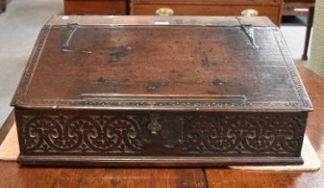 A 17th Century Oak Bible Box, with secret compartments behind the inner bank of drawers