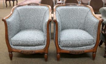 A Pair of Art Deco French Tub Chairs, with carved top & bottom rail, floral upholstery, stylised