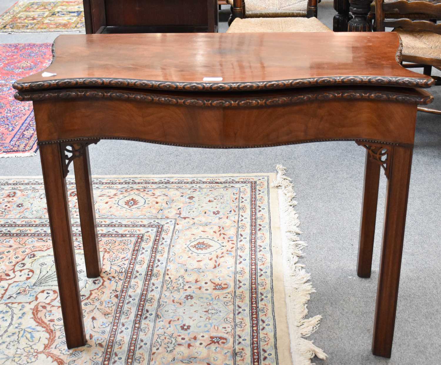 A George III Mahogany Chippendale-Style Foldover Tea Table, Late 18th Century, of serpentine- - Image 2 of 2