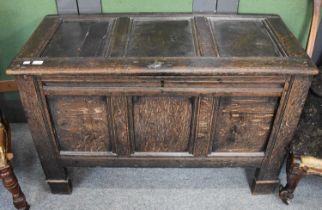 An 18th Century Three Panel Oak Coffer, carved with the intials I.B, 115cm by 51cm by 72cm