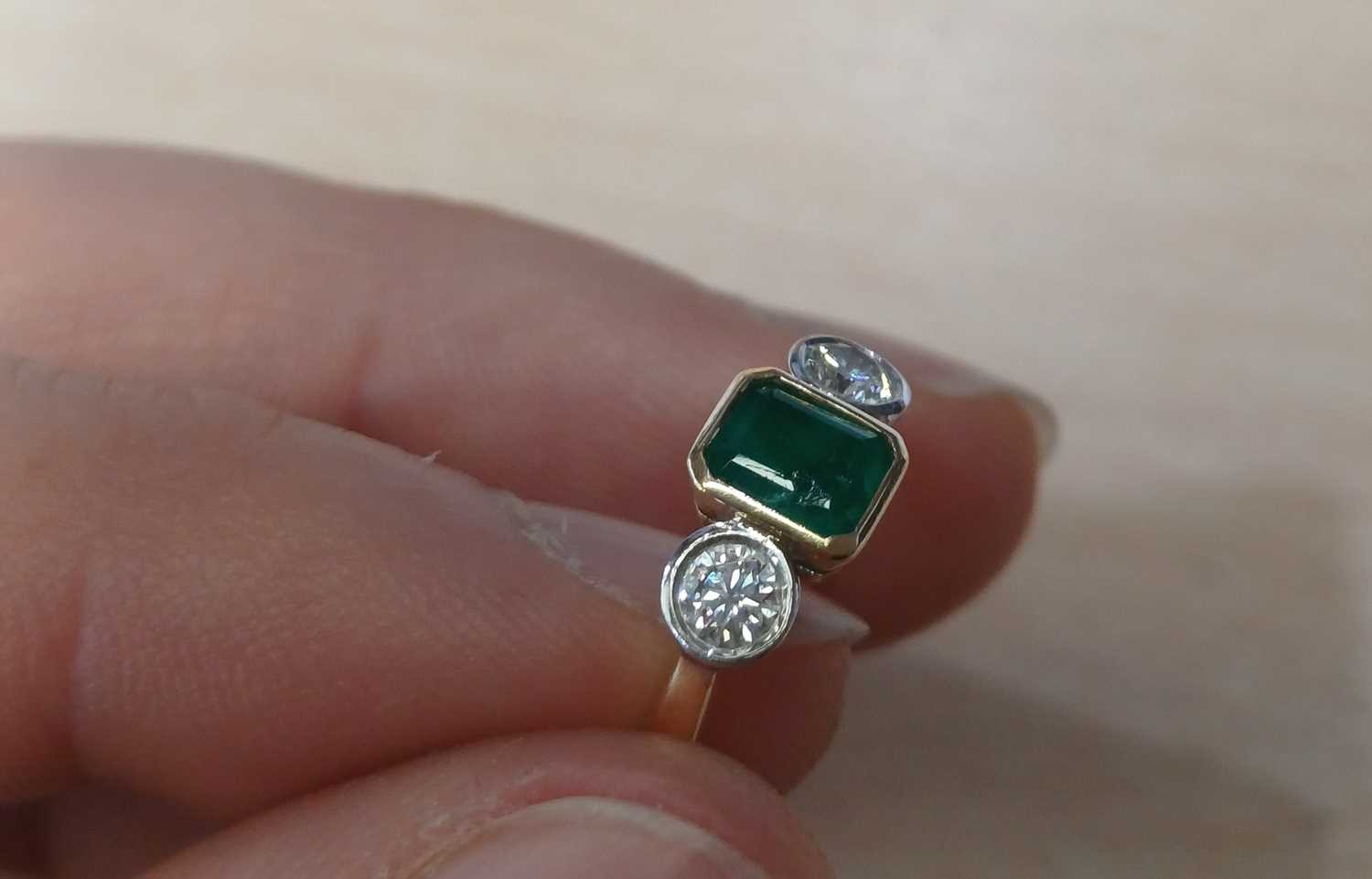 An 18 Carat Gold Emerald and Diamond Three Stone Ring the emerald-cut emerald in a yellow rubbed - Image 5 of 6