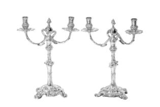 Two George III Silver Two-Light Candleabra, One Base by Ebenezer Coker, London, 1760, The Other Bas