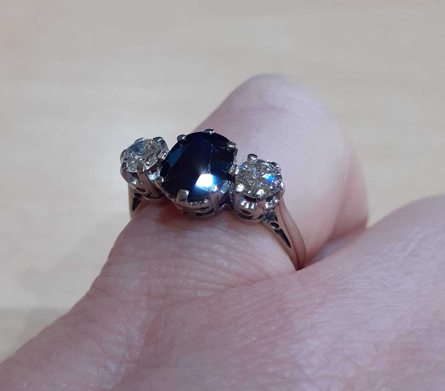An 18 Carat White Gold Sapphire and Diamond Three Stone Ring the oval cut sapphire flanked by - Image 3 of 4