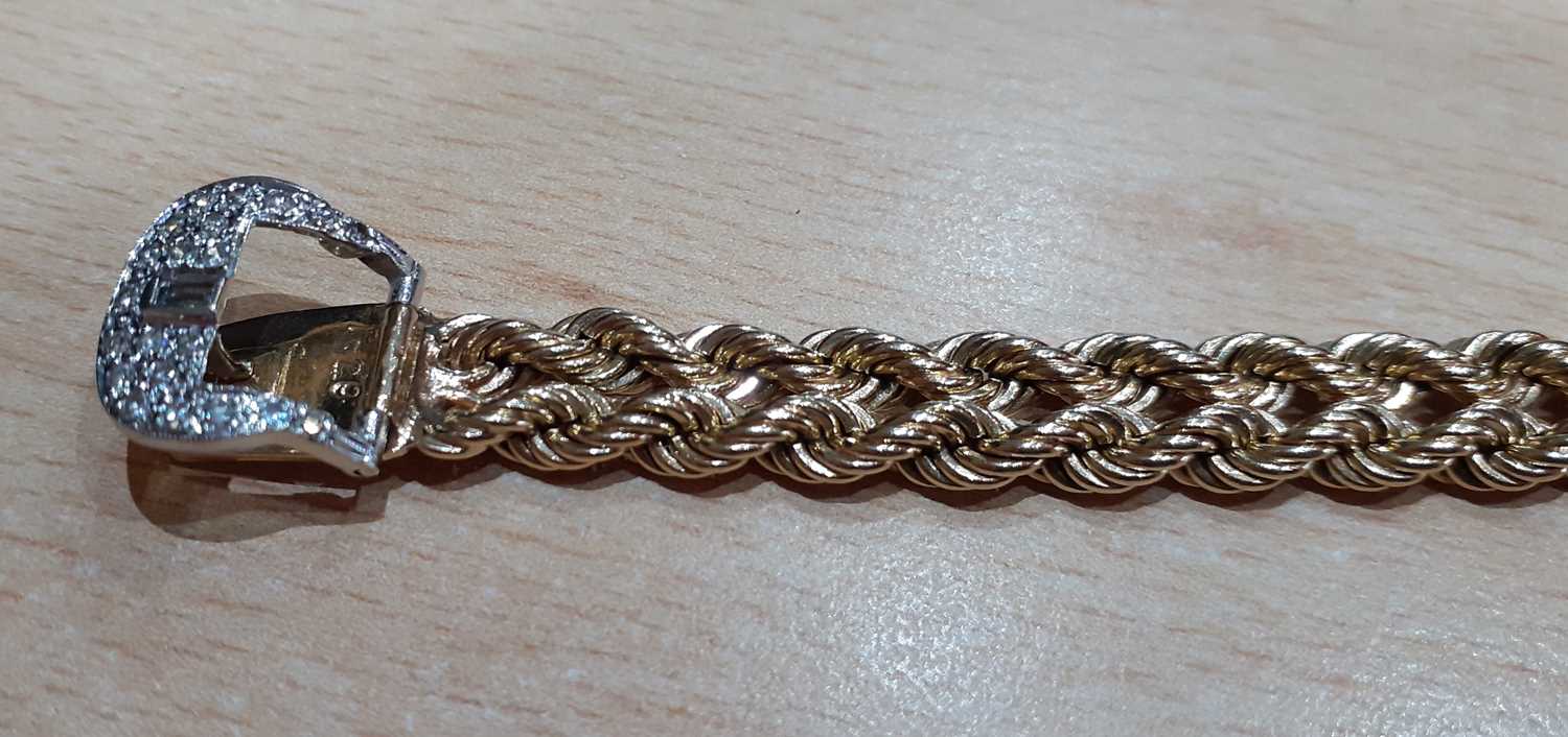 A Diamond Buckle Bracelet two rows of yellow rope twist chain terminating to an eight-cut and - Image 3 of 5
