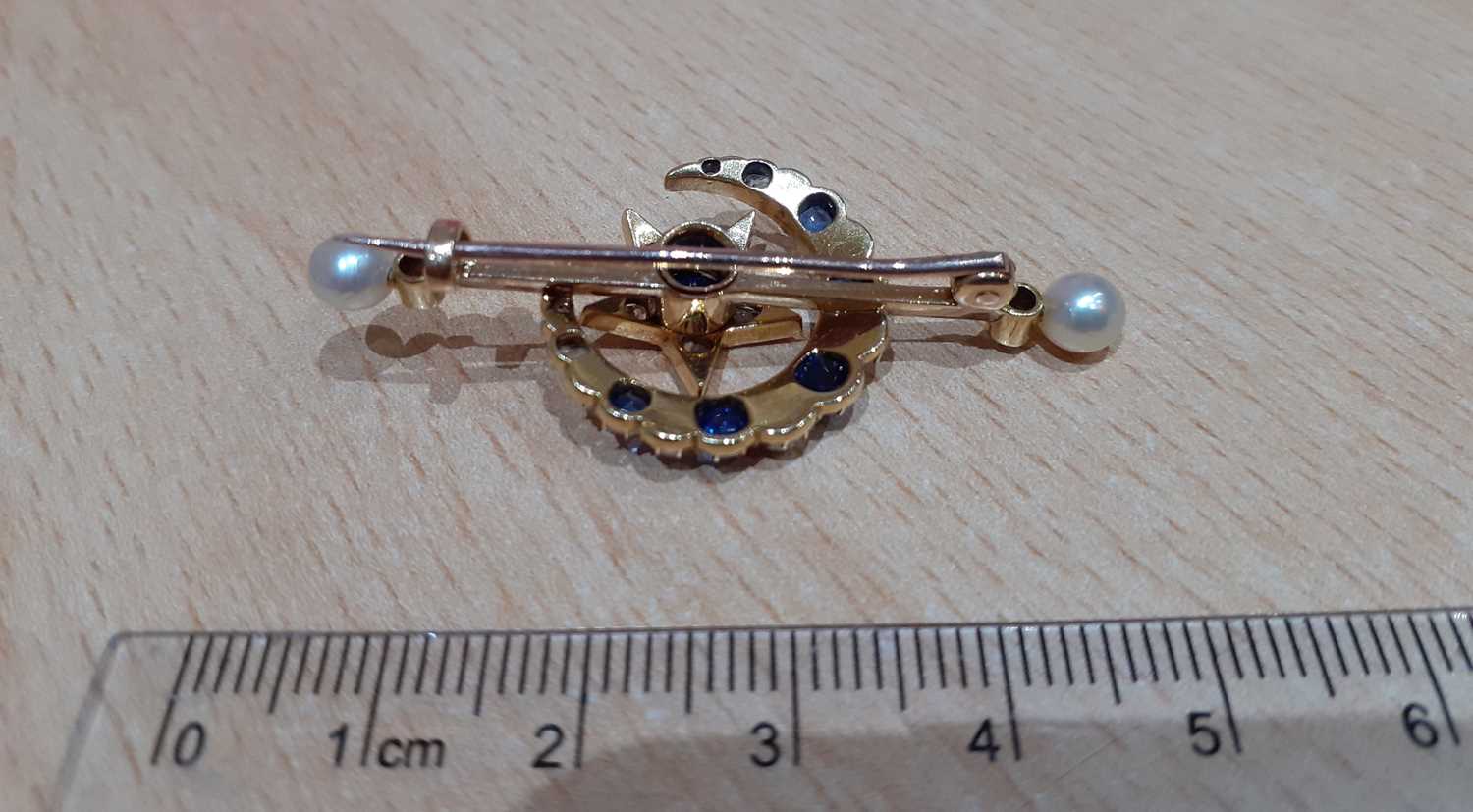 A Victorian Sapphire, Diamond and Pearl Star and Crescent Brooch the crescent comprised of graduated - Image 2 of 3