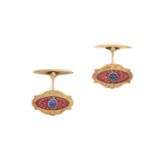 A Pair of Russian Sapphire and Enamel Cufflinks the pink oval enamel plaque with a round cabochon