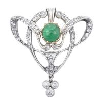 An Emerald and Diamond Pendant of openwork scroll form, set throughout with old cut diamonds,