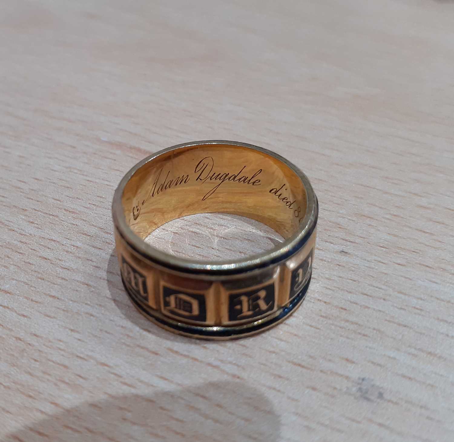 An 18 Carat Gold Enamel Mourning Ring the yellow broad band enamelled in black to read IN MEMORY OF, - Image 7 of 7