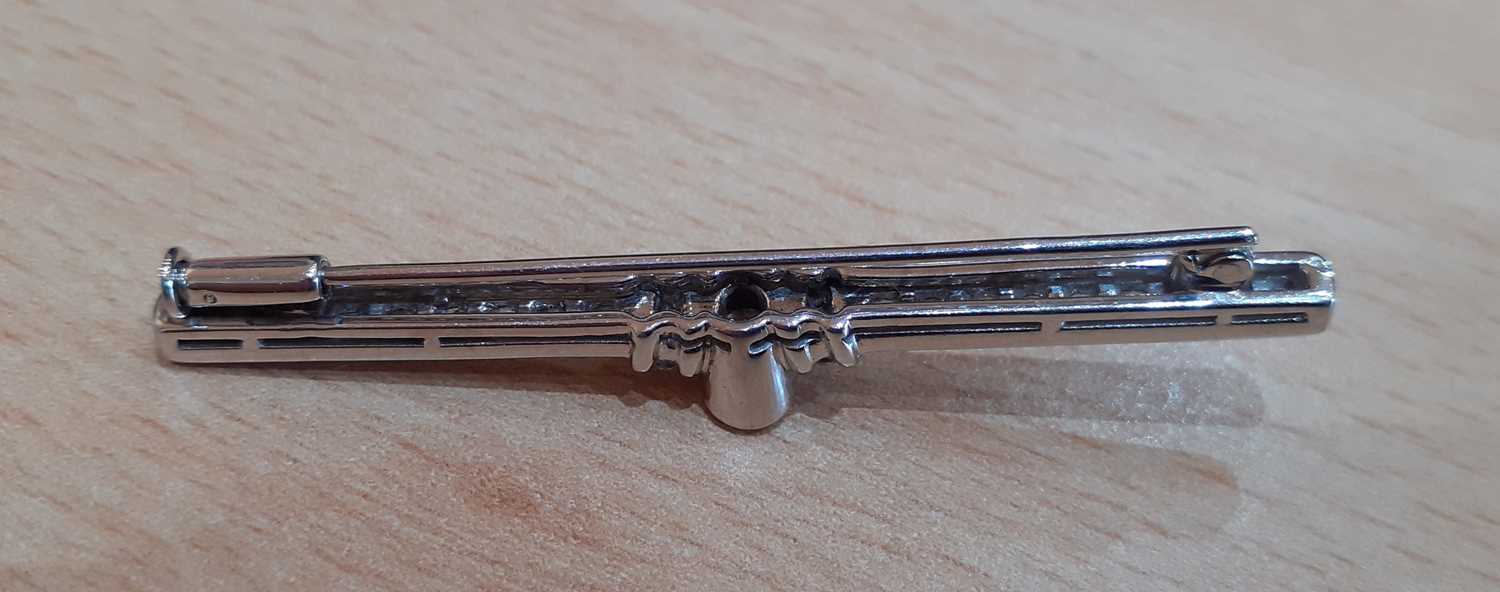 A Diamond Bar Brooch the bar set throughout with round brilliant cut diamonds, with a stepped - Image 3 of 3