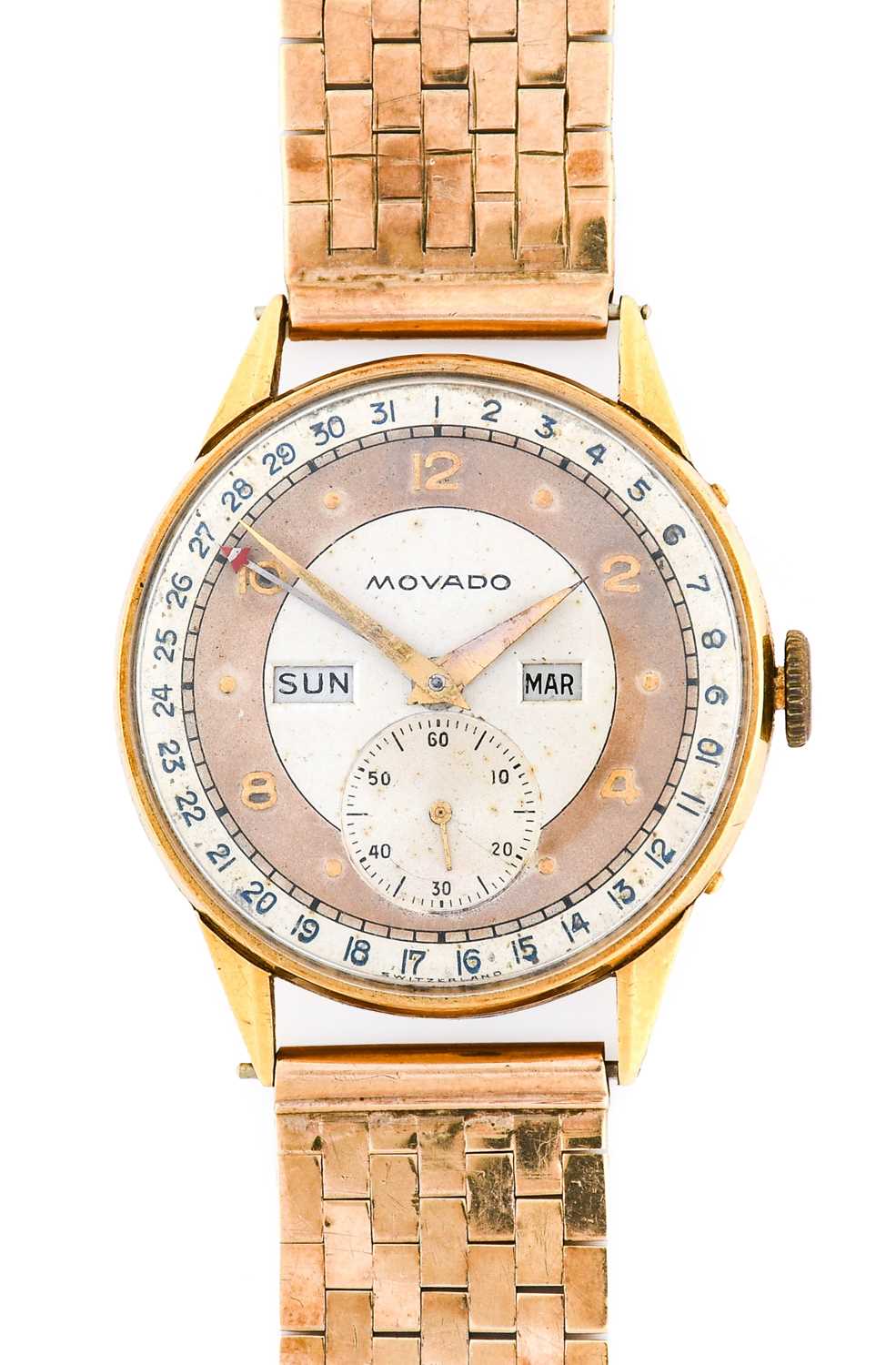 Movado: An 18 Carat Gold Triple Calendar Wristwatch, signed Movado, circa 1950, (calibre 470) manual