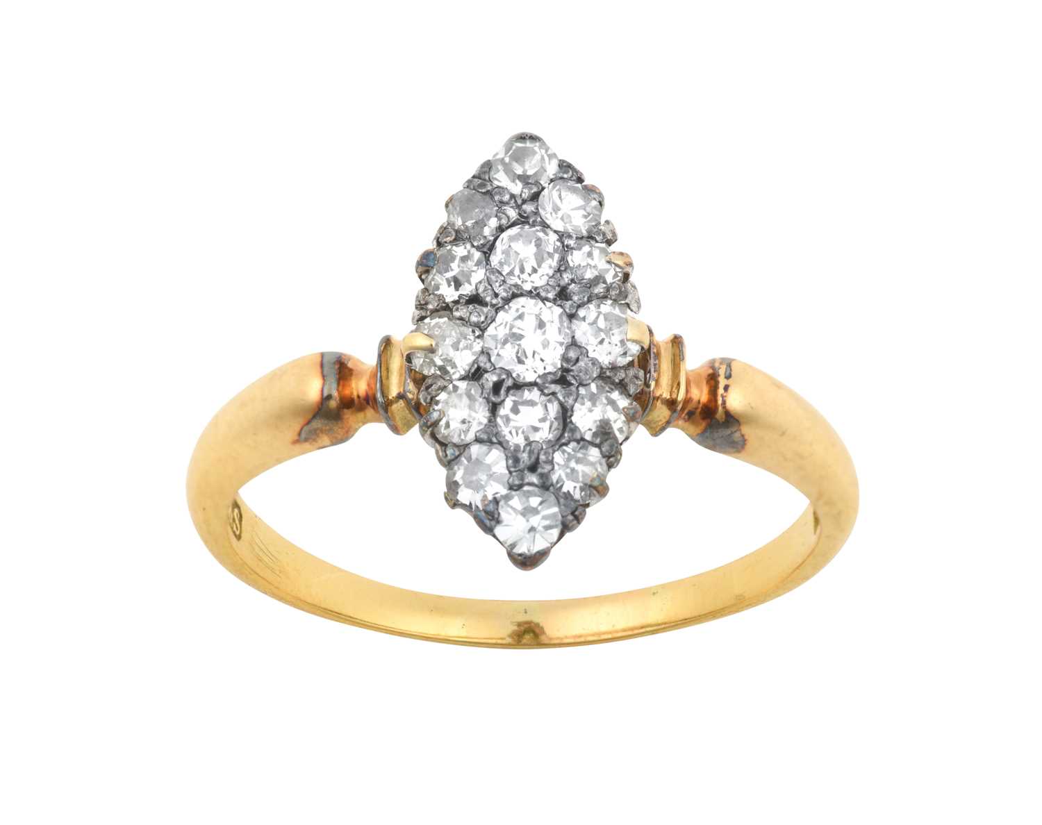 A Diamond Cluster Ring the navette form set throughout with old cut diamonds, in white claw