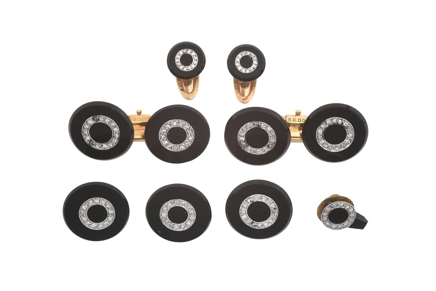 A Diamond and Onyx Cufflink, Button and Dress Stud Suite comprising of four buttons, two studs and a