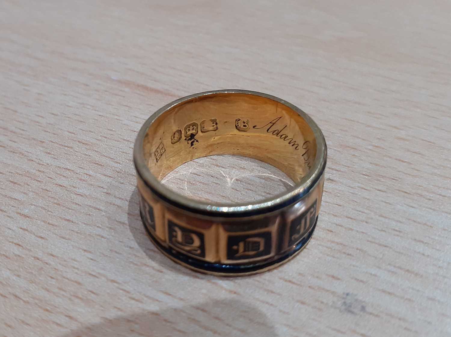 An 18 Carat Gold Enamel Mourning Ring the yellow broad band enamelled in black to read IN MEMORY OF, - Image 6 of 7