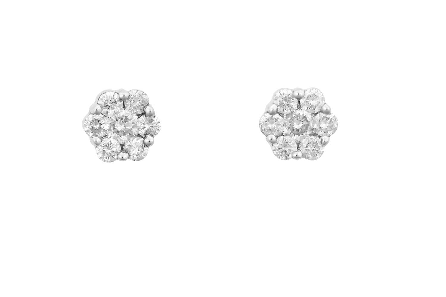A Pair of Diamond Cluster Earrings the clusters formed of round brilliant cut diamonds, in white