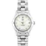 Tag Heuer: A Lady's Stainless Steel Calendar Centre Seconds Wristwatch, signed Tag Heuer, 300