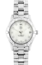 Tag Heuer: A Lady's Stainless Steel Calendar Centre Seconds Wristwatch, signed Tag Heuer, 300