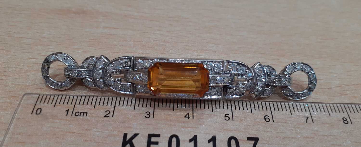 A Citrine and Diamond Brooch the emerald-cut citrine within a geometric border of eight-cut - Image 2 of 3