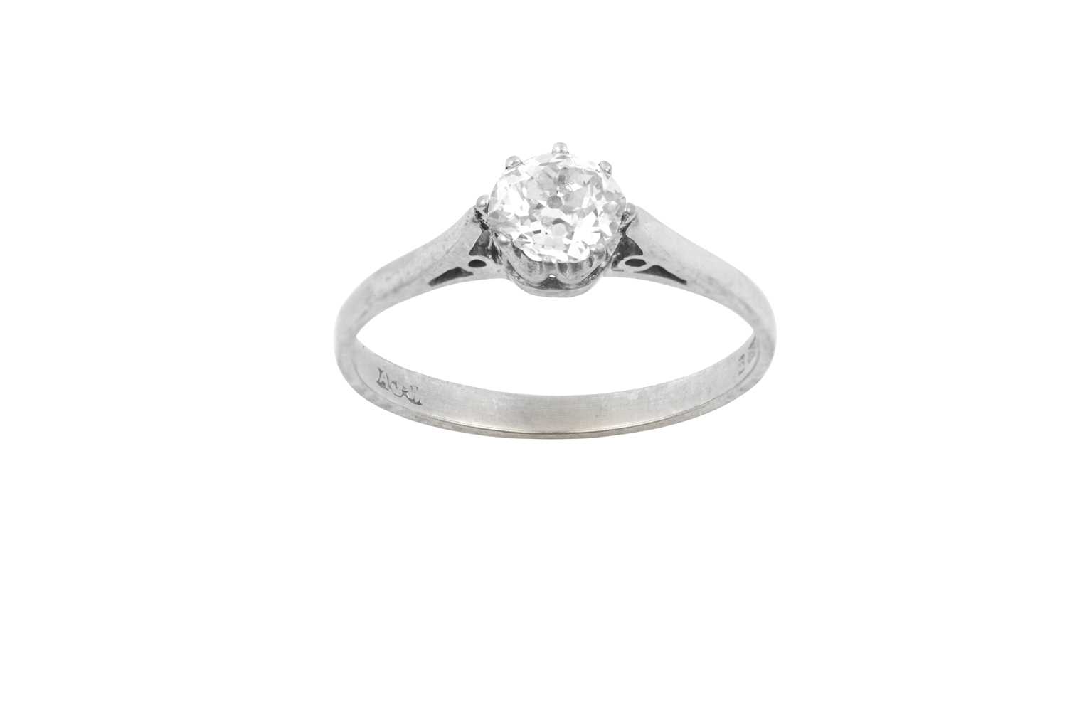 An 18 Carat White Gold Diamond Solitaire Ring the old cut diamond in a claw setting, to a tapered