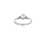 An 18 Carat White Gold Diamond Solitaire Ring the old cut diamond in a claw setting, to a tapered