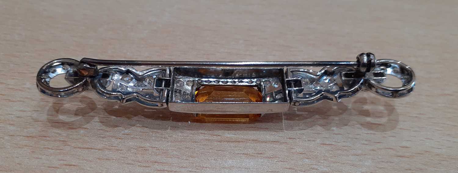 A Citrine and Diamond Brooch the emerald-cut citrine within a geometric border of eight-cut - Image 3 of 3