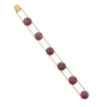 A Late 19th Century Garnet Bracelet six double chain linked round cabochon carbuncle garnets in