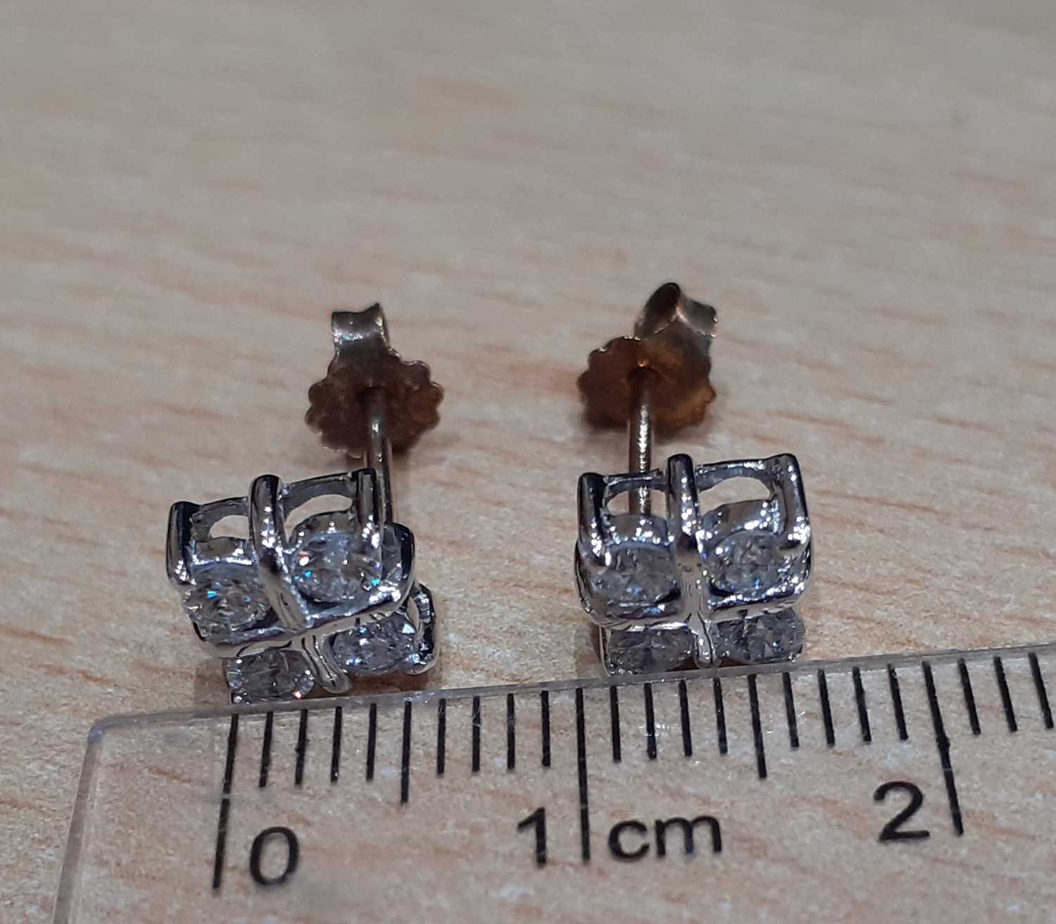 A Pair of Diamond Cluster Earrings four round brilliant cut diamonds in white claw settings, - Image 2 of 4
