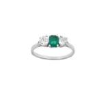 An Emerald and Diamond Three Stone Ring the emerald-cut emerald flanked by old cut diamonds, in