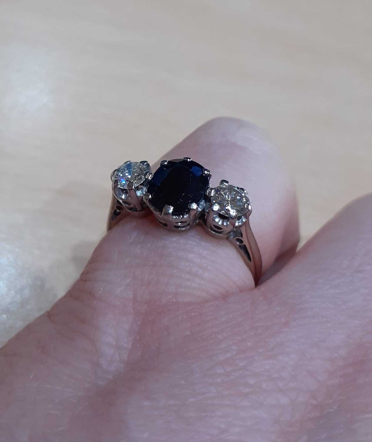 An 18 Carat White Gold Sapphire and Diamond Three Stone Ring the oval cut sapphire flanked by - Image 2 of 4