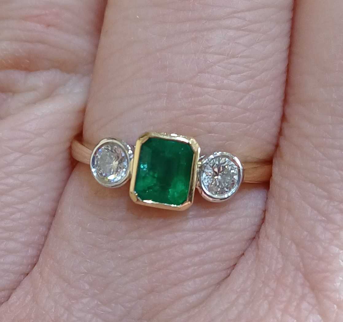 An 18 Carat Gold Emerald and Diamond Three Stone Ring the emerald-cut emerald in a yellow rubbed - Image 3 of 6