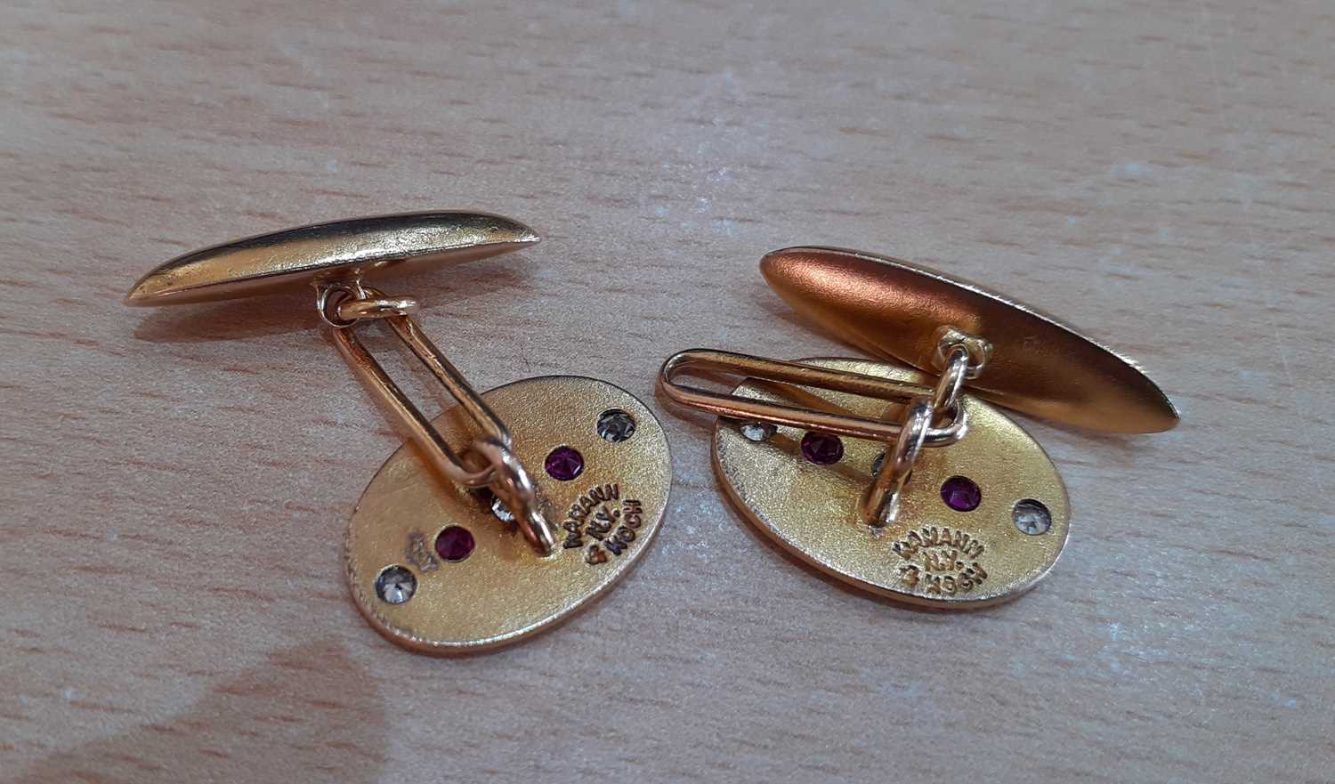 A Pair of Ruby and Diamond Cufflinks, by Hamann & Koch the yellow oval plaques inset with two - Image 3 of 3