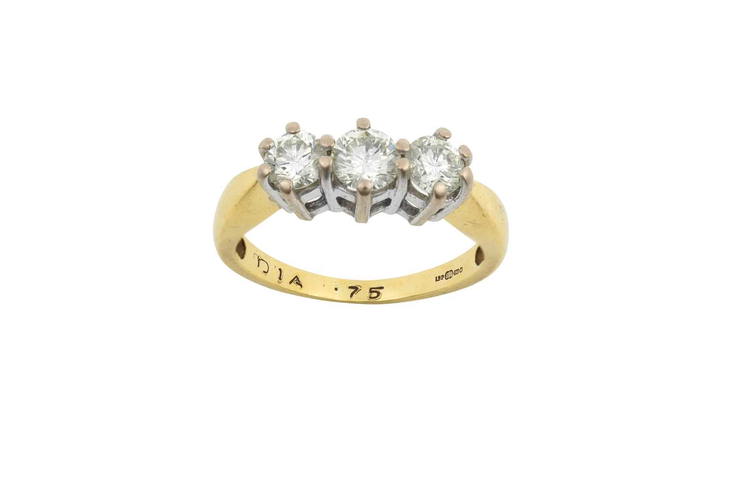 An 18 Carat Gold Diamond Three Stone Ring the round brilliant cut diamonds in white claw settings,