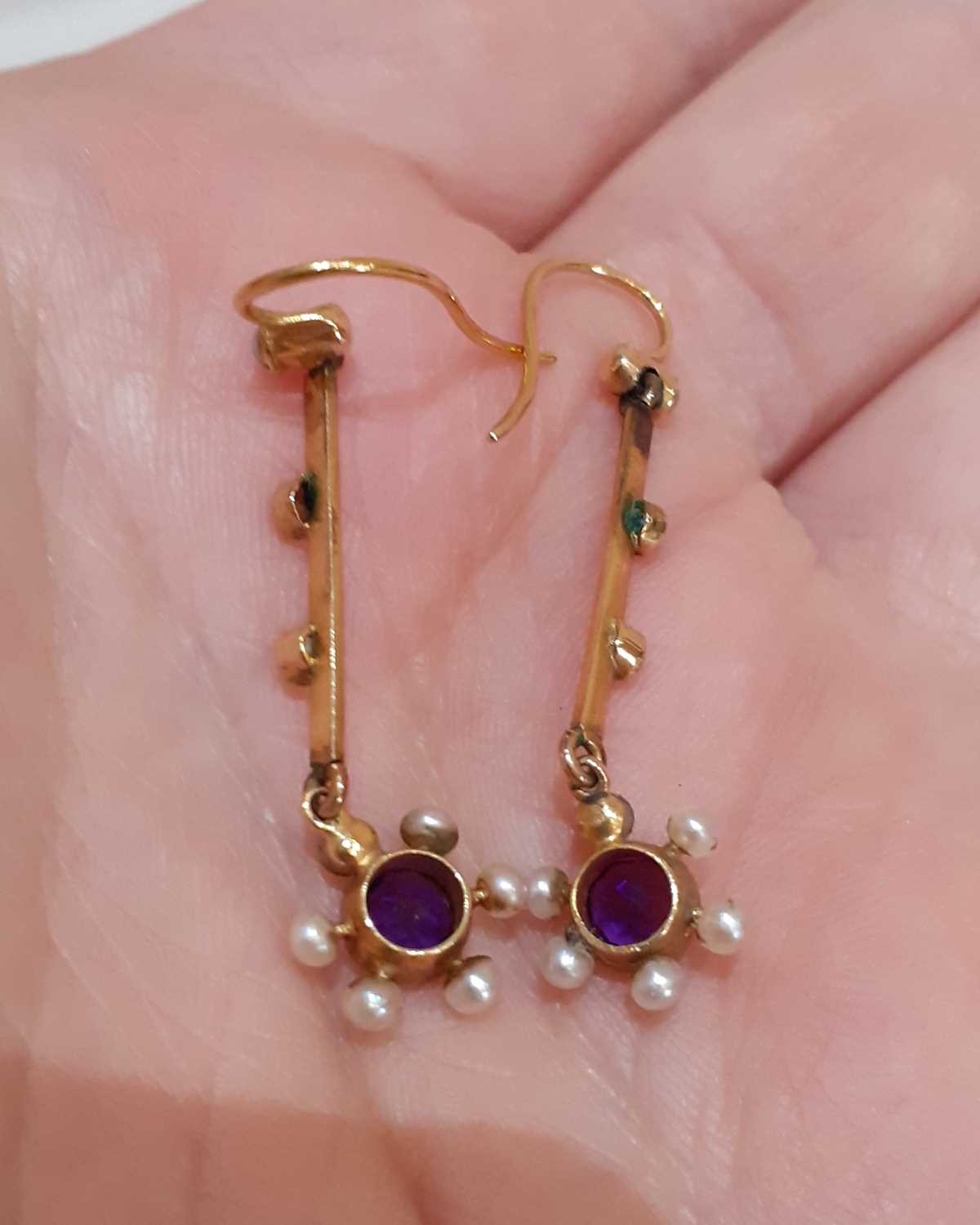 A Pair of Early 20th Century Amethyst and Seed Pearl Drop Earrings the round cut amethyst in a - Image 2 of 4