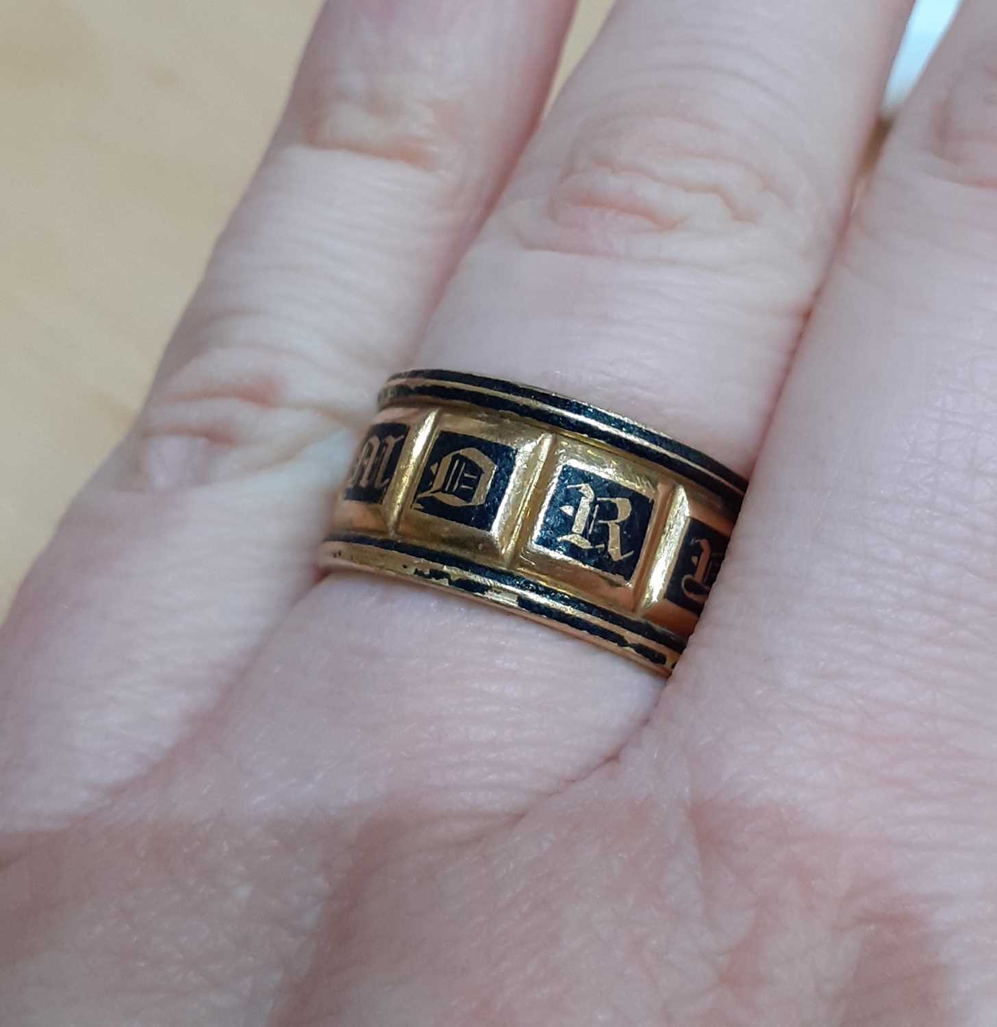 An 18 Carat Gold Enamel Mourning Ring the yellow broad band enamelled in black to read IN MEMORY OF, - Image 2 of 7