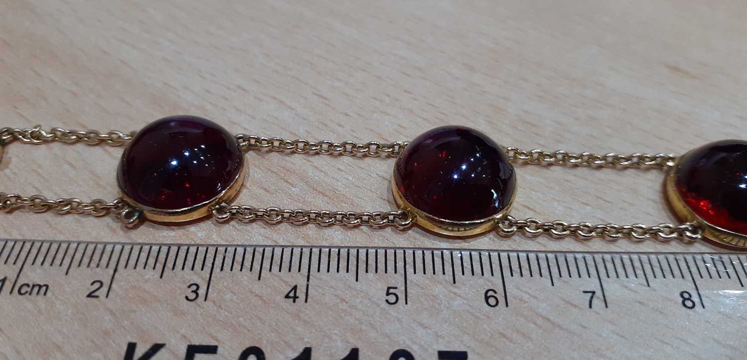 A Late 19th Century Garnet Bracelet six double chain linked round cabochon carbuncle garnets in - Image 3 of 4