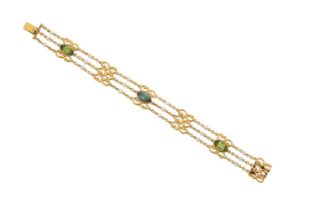An Early 20th Century Peridot, Green Tourmaline and Seed Pearl Bracelet three yellow trace link